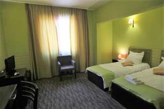 Отель Hotel Neptun Видин Двухместный номер с 1 кроватью или 2 отдельными кроватями-2