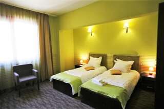Отель Hotel Neptun Видин Двухместный номер с 1 кроватью или 2 отдельными кроватями-3